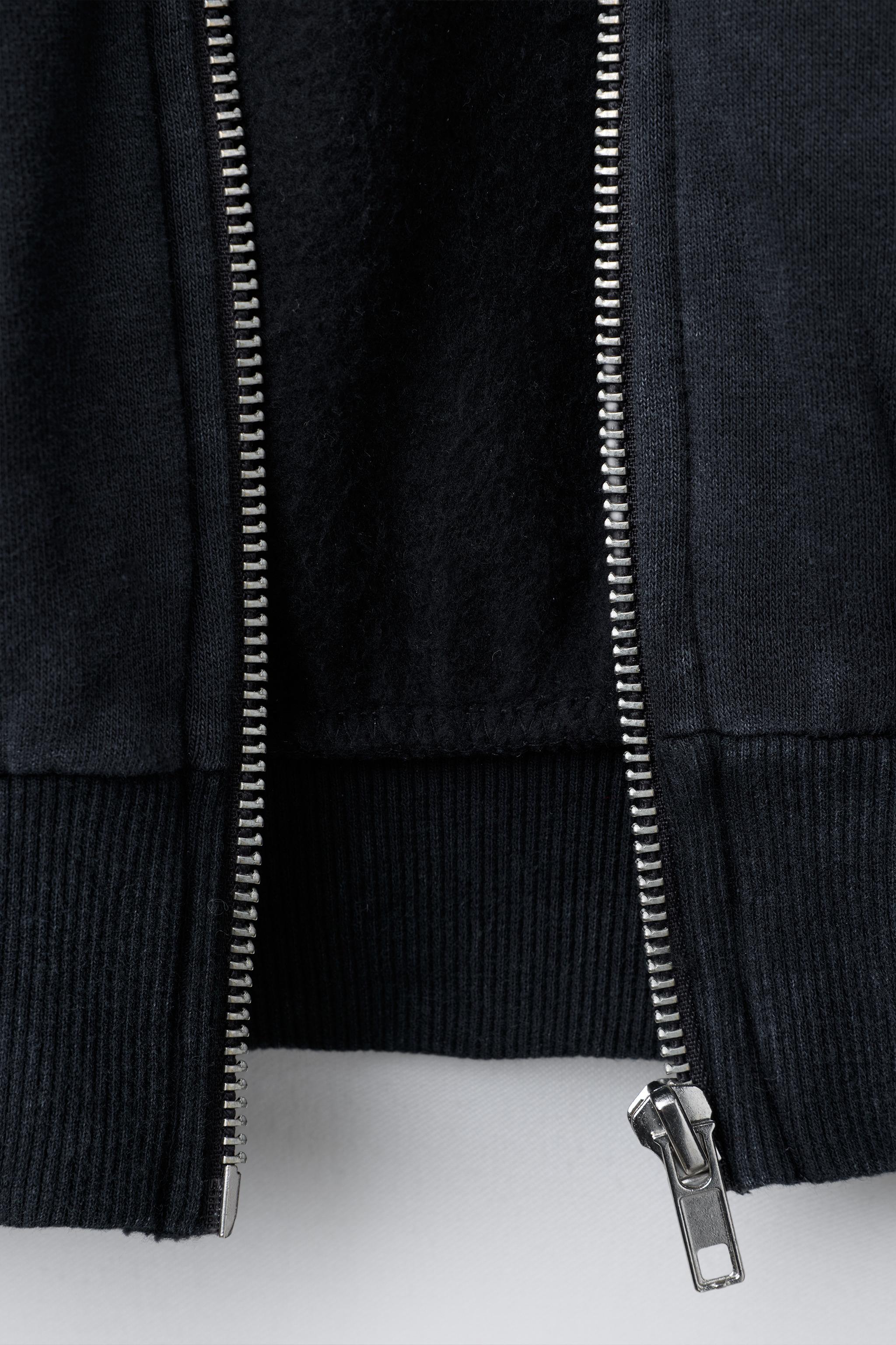 WASHED EFFECT STAR AND STUD HOODIE